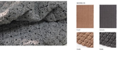 Alfombra de materia textil tejida a mano con la técnica embroidery. Se confeccionan los “momos”, que posteriormente se unirán mediante cosido. Dispone de una tela cosida sobre la superficie de la capa superior formada por los “momos”.
Medidas: Se importa en formatos de 170x240cm, 200x300cm, 48x30cm, 100x100 cm.
Peso total aprox.: 2,2 Kg/m², altura total aprox.: 19 mm,
Se utiliza para cubrir el suelo.
Composición: 100% lana.