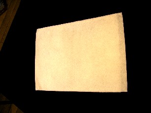 GANT DE TOILETTE, EN NON-TISSE MOLLETONNE, COUSU SUR LES DEUX COTES, DESTINE A UN USAGE UNIQUE.