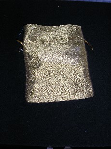 SACHET EN TISSU 100% POLYESTER, ASPECT ORGANZA TRANSPARENT, AVEC UN CORDON A NOUER, DESTINE A L'EMBALLAGE DE DIVERS ARTICLES, BIJOUTERIE, PRODUITS COSMETIQUES ETC...