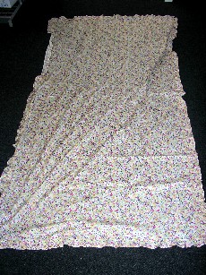 PIECE DE TISSU IMPRIMÉ RECTANGULAIRE DE COTON ( 100% COTON),DE TYPE PAREO, DIMENSIONS 100 X 184 CM, AVEC UN OURLET FRONCÉ SUR SON POURTOUR.