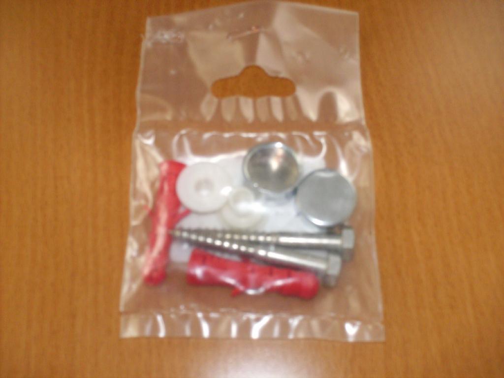 SACHET POUR FIXATION WC, CONTENANT:

-DEUX VIS FILETEE DE TYPE "TIRE-FOND" EN ACIER INOXYDABLE,
-DEUX CHEVILLES EN PCC,
-CAPUCHONS.