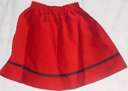 WOVEN SKIRT FOR GIRLS.  ELASTICATED WAIST WITHOUT OPENING.  HEMMED AT
BASE.  100% COTTON.  PACKED WITH SCARF, BLOUSE AND APRON OF DIFFERENT
FABRICS ALL CLASSIFIED SEPARATELY.