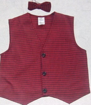 A WOVEN CHECKED WAISTCOAT FOR BOYS. WITH A V-NECK. WITH A COMPLETE OPE
NING WITH A LEFT OVER RIGHT BUTTON CLOSURE. HEMMED AT BASE WITH POINTS
 TO FRONT. 100% COTTON. WITH A BOW TIE OF THE SAME FABRIC, WITH ELASTI
C. PRESENTED WITH A PAIR OF TROUSERS,  ON A HANGER IN A POLYBAG.CLASSI
FIED SEPARATELY. CROSS REF - 112799461.