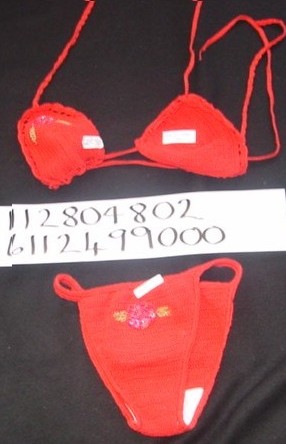 A CROCHETED BIKINI FOR WOMEN.  THE UPPER HAS STRAPS THAT TIE ROUND THE
 NECK AND BACK. WITH SHAPED FRONT AT THE BUST AREA WITH APPLIED BEADIN
G.  LOWER GARMENT CONSISTS OF BIKINI BRIEFS WITH A LINED GUSSET. WITH
APPLIED BEADED DESIGN ON THE FRONT.  PACKAGED TOGETHER AS A SET. 100%
COTTON.