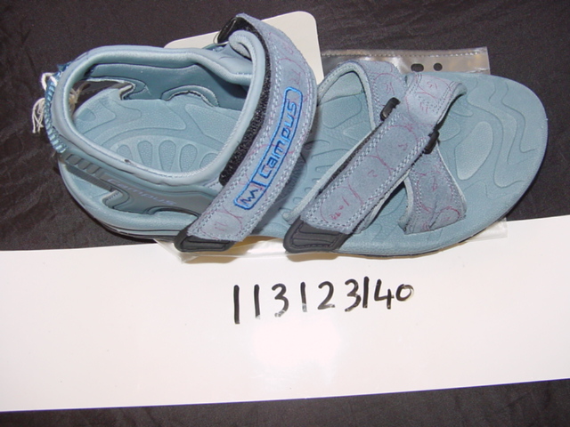 UNISEX SANDAL FOR ADULTS. UPPER OF LEATHER (SUEDE) AND PLASTIC, HOWEVER THE LEATHER IS THE PREDOMINATING MATERIAL. WITH A VAMP MADE OF STRAPS ONE OF WHICH IS VELCRO FASTENING. OPEN AT THE TOES.  VELCRO FASTENING STRAPS AROUND THE ANKLE. OUTER SOLES OF PLASTIC. IN-SOLE LENGTH OF MORE THAN 24CM. COMBINED SOLE AND HEEL HAS A HEIGHT OF LESS THAN 3CM. NOT COVERING THE ANKLE.