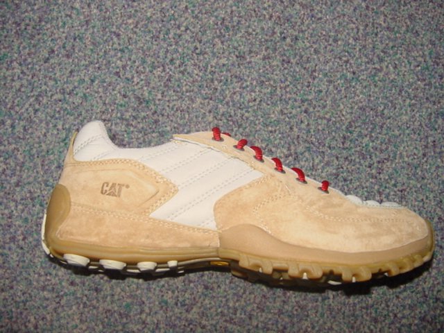 MENS TRAINER STYLE SHOE. NOT COVERING THE ANKLE. UPPERS OF LEATHER AND TEXTILE MATERIAL. LEATHER PREDOMINATES. OUTER SOLES OF RUBBER. WITH LOGO ON UPPER AND TONGUE. LACE UPS. INSOLE LENGTH EXCEEDING 24 CMS. NO VISIBLE EVIDENCE OF ANY SPECIAL TECHNOLOGY FEATURES.