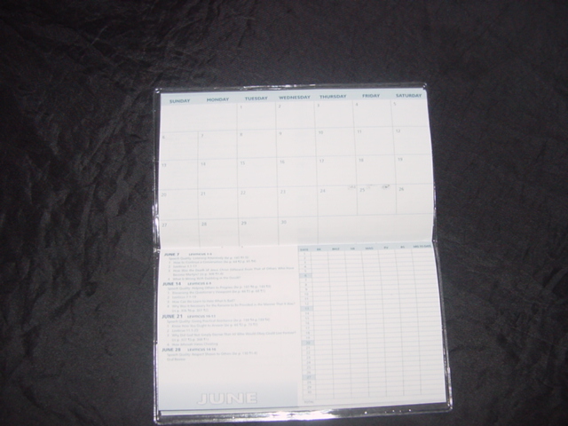 A ONE YEAR POCKET APPOINTMENT CALENDAR (DIARY). ON PAPER WITH A CARD OUTER AND A TRANSLUCENT PLASTIC JACKET. FOLDED AND STAPLED.