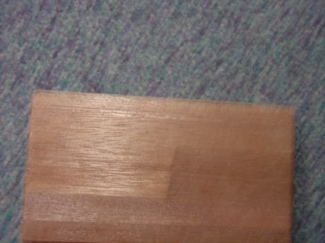 MARANTI WOOD CONTINUOUSLY SHAPED. BUTT JOINTED IN WIDTH AND FINGER JOINTED IN LENGTH.VENEER COVERED ON ONE FACE AND TWO EDGES. TO BE USED FOR JOINERY FINISHINGS.