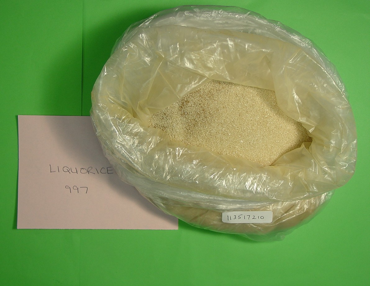 LIQUORICE EXTRACT CONTAINING MORE THAN 10% BY WEIGHT OF SUCROSE BUT NOT CONTAINING ANY OTHER ADDED SUBSTANCES. PRODUCT CONTAINS 97% OF WHITE CRYSTAL SUGAR AND 3% OF LIQUORICE EXTRACT. THE PRODUCT IS PACKED IN 1 KG BAGS. THE PRODUCT IS BROWN/YELLOW IN COLOUR WITH THE FRAGRANCE OF LIQUORICE. USED FOR MAKING CONFECTIONERY, FLAVOURING TEA, ETC.