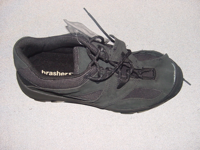 MEN'S WALKING/TREKKING SHOES.  NOT COVERING THE ANKLE.  LACE UP STYLE.  UPPERS OF SUEDE (LEATHER) AND TEXTILE WHERE THE SUEDE PREDOMINATES.  WATERPROOF.  HEAVY TREAD OUTER SOLE OF RUBBER. INSOLE OF 24CMS OR MORE.