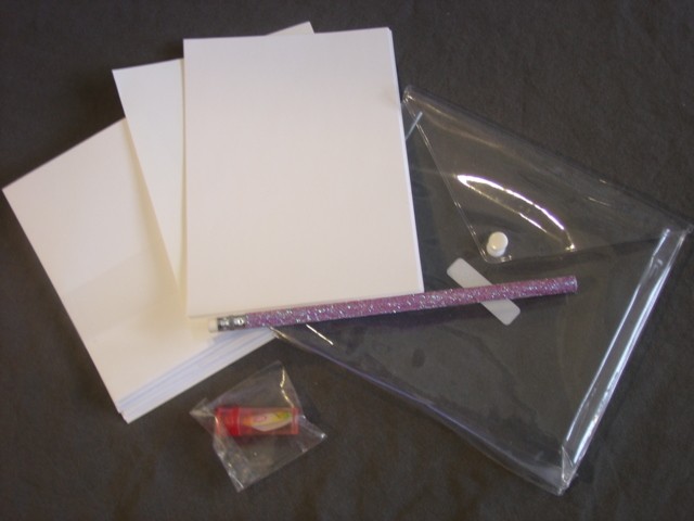 WRITING SET INCLUDING TEN SHEETS OF WRITING PAPER AND TEN ENVELOPES PRINTED ON ONE SIDE WITH IMAGES OF UNICORNS, ONE SMALL SELF INKING STAMP, ONE PENCIL WITH A  RUBBER ON THE END, AND ONE STICKER SHEET PRINTED WITH IMAGES OF UNICORNS. LIST OF CONTENTS ENCLOSED. PACKAGED FOR RETAIL SALE IN A PVC  WALLET.