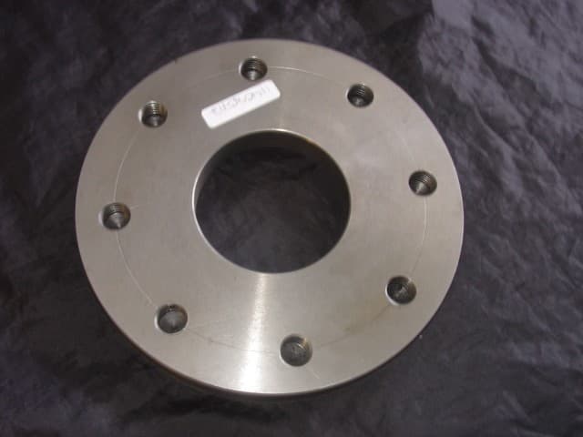 GOODS ARE A TYPE OF A FLANGE CONVERTER. MADE FROM DUCTILE IRON. GOODS ARE CAST IN A WOODEN PATTERN, BLAST CLEANED, MACHINED USING A LATHE, DRILLED AND TAPPED, THEN RUST PROOFED WITH AN OIL COATING. THE PRODUCT IS USED TO CONNECT TWO DISSIMILAR PIPE FLANGES SIZES OR TYPES TOGETHER. GOODS WILL BE PACKAGED IN WOODEN CRATES FOR TRANSPORTATION.