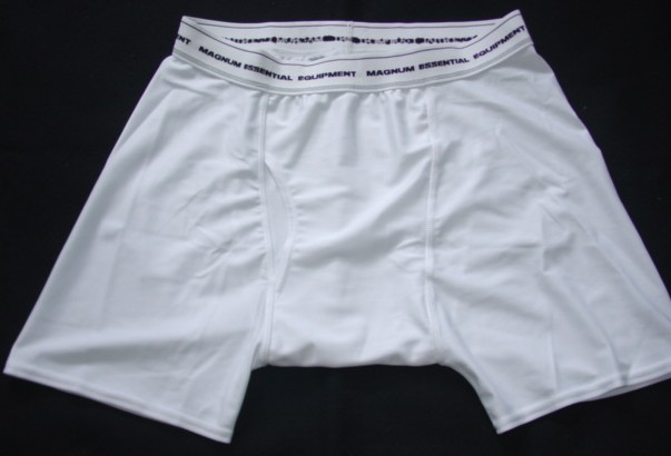A PAIR OF KNITTED BRIEFS FOR MEN.  DESIGNED TO COVER THE LOWER PART OF THE BODY FROM THE WAIST TO THE THIGH.  WITH AN APPLIED ELASTICATED WAISTBAND WITHOUT OPENING.  WITH A  LEFT OVER RIGHT FLY OPENING.  HEMMED AT LEG ENDS.  WITH LOGO AROUND WAISTBAND.  96% POLYESTER.  4% SPANDEX..  PACKAGED WITH CARDBOARD IN A POLYBAG FOR RETAIL SALE.