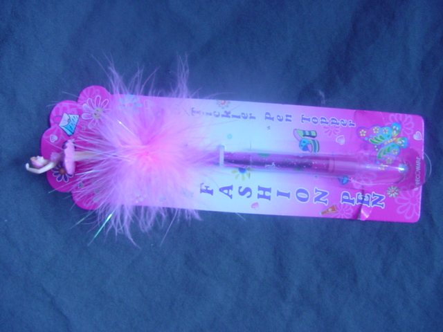 BALL POINT PEN. HARD PLASTIC CASING WITH PAINTED FLOWER AND BUTTERFLY DECORATION. WITH A CAP, ON THE TOP IS THE FIGURE OF A BALLERINA ON A SPRING. MADE OF PLASTIC MATERIAL, WITH FEATHERS AT HER FEET.  THE PEN IS APPROX 14.5CM.THE BALLERINA MEASURES APPROX 6CM LONG. PACKAGED FOR RETAIL SALE ON A PRINTED CARD.