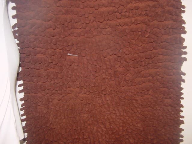 A COTTON FLOOR RUG HAND WOVEN MADE OF 100% COTTON. THE RUG HAS A LOOPED PILE. SIZE IS APPROX 60CM X 120CMS.