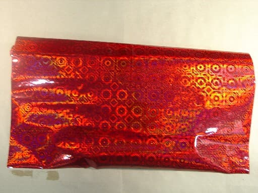 SELF ADHESIVE HOLOGRAPHIC PAPER ROLL 400M BY 1M. 0.05MM POLYPROPYLENE FILM LAMINATED ON RELEASE PAPER WITH PERMANENT ADHESIVE.
