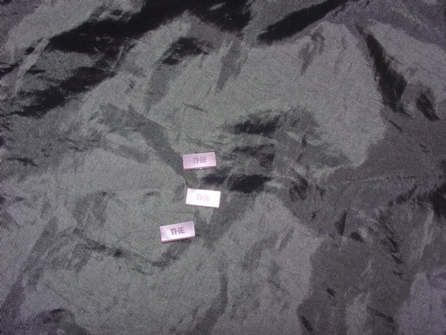 BUTTON BLANK. MADE OF PLASTIC. MEASURES APPROX 1.5 CMS(L).