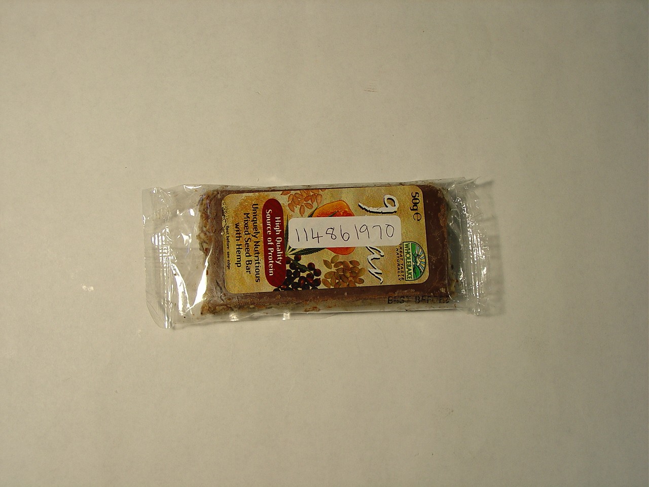 A BAKED SNACK BAR CALLED 9 BAR AND SOLD AS INDIVIDUAL BARS OF 50 GRAMS EACH. INGREDIENTS: SUNFLOWER SEEDS, PUMPKIN SEEDS, CAROB TOPPING (SUGAR, VEGETABLE FAT, SOYA, CAROB, EMULSIFIER, LECITHIN), RAW CANE SUGAR, HONEY, SESAME SEEDS, VEGETABLE OIL, DEHULLED HEMP SEED, POPPY SEED. CONTAINS ALL 9 ESSENTIAL AMINO ACIDS. HIGH IN UNPOLYUNSATURATED FATS.