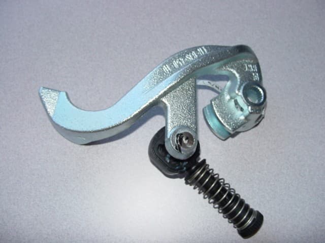 ASSEMBLY WHICH IS PART OF A MOTOR VEHICLE GEAR  SHIFT SYSTEM . IT IS IS MADE OF DIE CAST ALUMINIUM, ALSO INCLUDES AN INTERGRATED PLASTIC PART WITH SPRING.