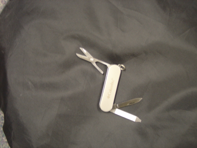 POCKET TOOL CONSISTING OF A NAIL FILE WITH SLOTTED SCREWDRIVER END, MINI SCISSORS AND KNIFE. ALL TOOLS FOLD AWAY INTO THE HANDLE. MADE OF STAINLESS STEEL. PACKAGED FOR RETAIL SALE IN CLAMPACK PACKAGING  WITH A PLIERS MULTI TOOL  AND LED TORCH WHICH HAVE BEEN CLASSIFIED SEPARATELY.