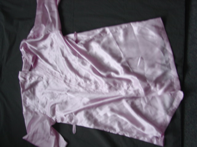 A WOVEN SATIN DRESSING GOWN FOR LADIES. WRAPOVER STYLE WITH A TIE BELT. WITH  BELT LOOPS. WITH THREE QUARTER LENGTH SLEEVES. HEMMED AT SLEEVE ENDS AND BASE OF GARMENT. OF POLYESTER.