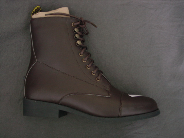 A BOOT WITH UPPER OF PLASTIC (SYNTHETIC LEATHER) AND OUTER SOLE OF PLASTIC (TPR).  REACHING ABOVE THE ANKLE BUT NO PART OF  THE CALF.  WITH LACES AT CENTRE FRONT.  PACKED IN A CARDBOARD BOX FOR RETAIL SALE.