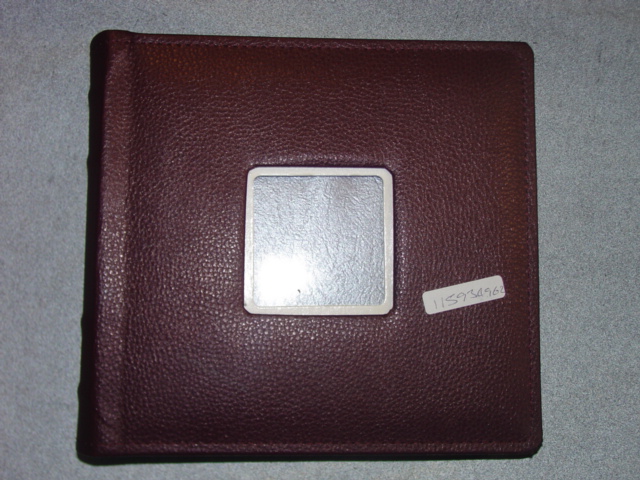 PACK OF THREE LEATHER BOUND PHOTOGRAPH ALBUMS.  PAPERBOARD PAGES. EACH PAGE HAS TWO PLASTIC PROTECTIVE POCKETS FOR PHOTOGRAPHS. WITH A SMALL WINDOW TO PLACE A PHOTGRAPH IN THE FRONT COVER.   ALBUM MEASURES 23.5 CMS (W)  X 22.5 CMS (L) X 4 CMS (D).