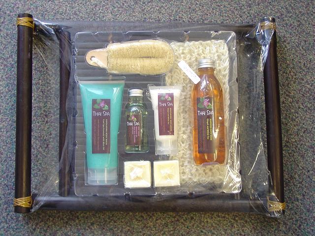 TOILETRY SET OF BATH PREPARATIONS CONSISTING OF A 250 ML BOTTLE OF WARMING BATH SOAK,  A 50 ML BOTTLE OF DEEP TISSUE MASSAGE OIL, A 20 ML TUBE OF EXFOLIATING BODY WASH AND A 50 ML TUBE OF MOISTURISING BODY LOTION.  THIS IS PRESENTED AS PART OF A RETAIL GIFT SET WHICH CONTAINS ADDITIONALLY: TWO VOTIVE CANDLES, SISAL AND A BATH BRUSH ON A BAMBOO TRAY.  THE ADDITIONAL ITEMS WILL BE CLASSIFIED SEPARATELY.