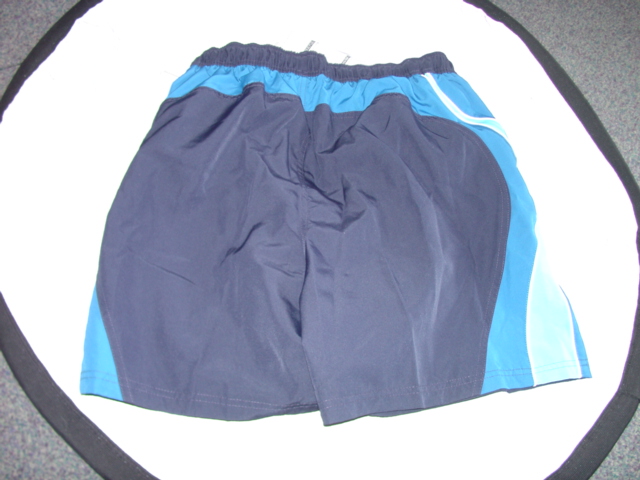 MENS WOVEN SWIMMING SHORTS. DESIGNED TO COVER THE LOWER PART OF THE BODY FROM THE WAIST TO MID THIGH. ENVELOPING EACH LEG SEPARATELY. WITHOUT AND OPENING. WITH ELASTICATED WAIST. WITH DRAWSTRING. WITH INNER MESH BRIEF STYLE LINING.HEMMED AT LEGS. OF POLYESTER.