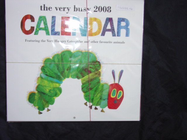 A PRINTED CALENDAR FOR 2008 WITH AN ILLUSTRATION OF A CATERPILLAR ON THE FRONT AND A CARDBOARD BACKING. THERE ARE ILLUSTRATIONS OF VARIOUS ANIMALS SUCH AS SHEEP, BEETLES AND BEES ON SOME PAGES. THERE ARE PUNCHED HOLES AT THE BOTTOM OF THE PAGE SO THE CALENDAR CAN BE HUNG UP.INCLUDED WITH THE CALENDAR ARE SOME STICKERS TO MARK SPECIAL DAYS.