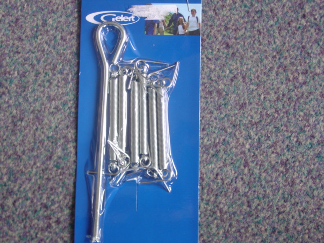PACKET OF 6 STEEL COIL TENSION SPRINGS AND A HAND TOOL. DESIGNED TO REPAIR CAMPING AIRBEDS. THE SPRINGS ARE BLISTER PACKED ON A CARDBOARD HEADER.
