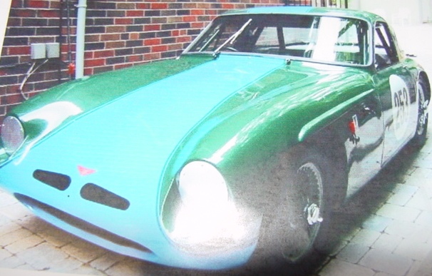 A 1959 TVR SPORTS GRANTRA MK1.  IT IS A WIRE WHEELED TWO-PLACE COUPE, PAINTED GREEN AND BLUE, WITH AN INTERIOR OF ALUMINIUM AND FIBREGLASS.