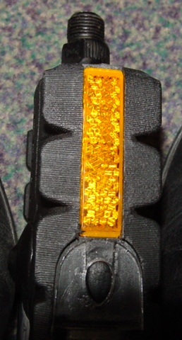 A BICYCLE PEDAL WHICH IS FITTED WITH LED BATTERY OPERATED LIGHTS WHICH IS AN INTEGRAL PART OF THE PEDAL.  THE LIGHTS ARE PRESSURE ACTIVATED WITH A LIGHT SENSITIVE SWITCH.
