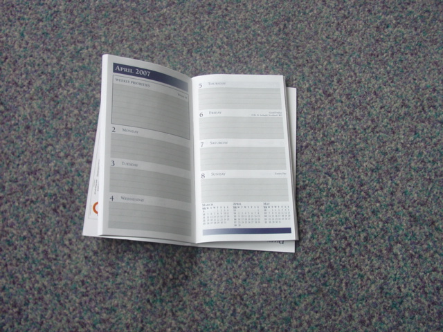 A DIARY INSERT MADE OF PAPER. CONSISTING OF A DIARY, SPACE FOR PERSONAL INFORMATION, MAP, NOTES ETC.