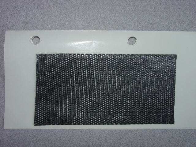 GEOTEXTILE FABRIC BACKED WITH A RUBBERISED BITUMEN COATING WHICH IS VISIBLE TO THE NAKED EYE. WEIGHT OF THE TIGHTLY WOVEN POLYPROPYLENE TEXTILE FABRIC IS 112GM/M2. USED TO PROTECT PIPELINE FROM CORROSION. AVAILABLE IN 2 INCH (5CM), 4 INCH (10CM) AND 6 INCH (15CM) WIDTHS.