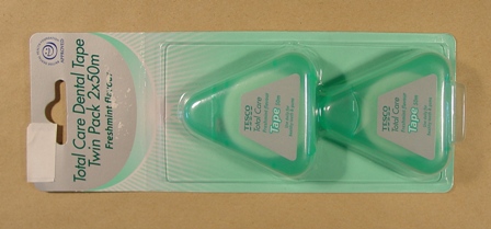 TWIN PACK OF 2 X 50 METERS OF DENTAL FLOSS WHICH IS USED TO REMOVE PLAQUE AND FOOD PARTICLES FROM BETWEEN THE TEETH AND ALONG THE GM LINE.  PREVENTS DECAY AND STRENGTHENS TOOTH ENAMEL.  THE FLOSS IS INSIDE A TRANSPARENT GREEN PLASTIC HOLDER IN THE SHAPE OF TRIANGLES WITH A FLIP UP LID.