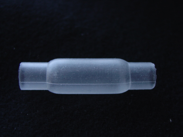 MOULDED CUFF MADE OF SILICONE RUBBER.  THE COMPONENT FORMS PART OF A  LARYNGEAL MASK  WHICH IS USED AS A MEDICAL ANAESTHETIC  DEVICE. THE CUFFS  PHYSICAL DIMENSIONS ARE APPROXIMATELY 50MM IN LENGTH WITH A DIAMETER VARYING BETWEEN  8MM AT THE ENDS TO 12 MM IN THE MIDDLE.