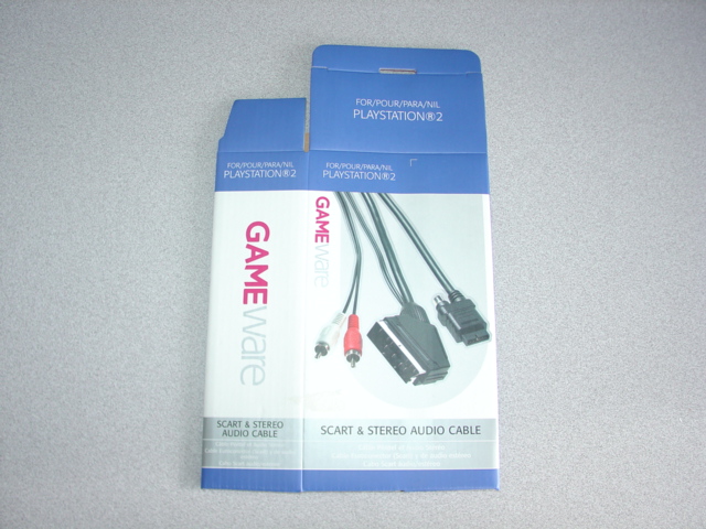 FLAT PACK FOLDING CARDBOARD BOX FOR SCART AND STEREO AUDIO CABLES. OF NON CORRUGATED PAPER. WITH PRINTED COMPANY NAME AND PRODUCT DETAILS. MEASURES APPROX 10CMS X 19CMS X 5CMS.