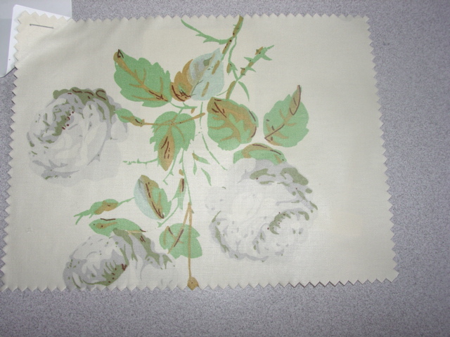 WOVEN PLAIN WEAVE FABRIC. OF 100 PERCENT COTTON.  WEIGHING 152 GRAMS PER METRE SQUARED.WITH PRINTED FLORAL DESIGN. NOT MANUFACTURED ON HAND LOOM NOR HAND PRINTED BY THE BATIK METHOD.
