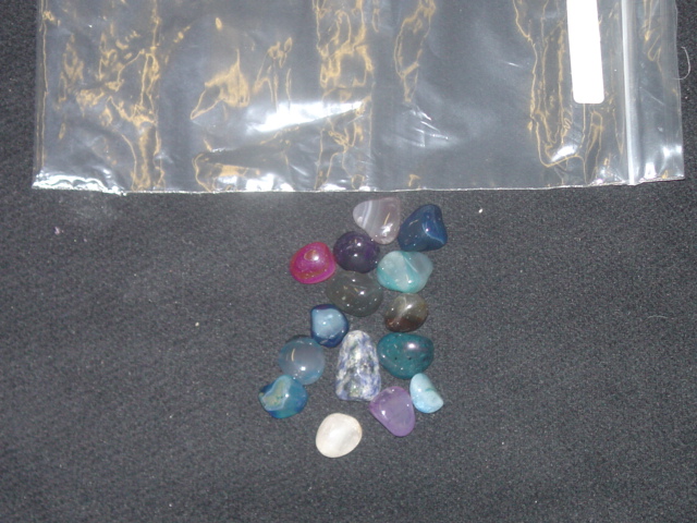 POLISHED STONES OF VARYING COLOURS AND SIZES. PACKAGED IN BAGS EITHER WEIGHING 4.5 KG OR 11 KG. NOT CONSIDERED TO BE SEMI PRECIOUS STONES.