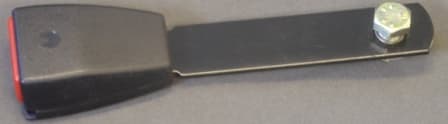 BUCKLE STALK MADE OF STEEL . THIS IS PART OF THE BUCKLE ASSEMBLY THAT THE SEAT BELT TONGUE CLIPS INTO.FOR PERMANENT FIXTURE TO MOTOR  VEHICLES.  THE STEEL STALK IS 13 CENTIMETERS LONG, RECTANGLE SHAPE . SMOOTH FINFISH WITH A CURVED BOTTOM WHICHIS FITTED WITH A METAL SCREW, WAVE WASHER, STEPPED SPACER AND A KEEP WASHER. THIS END WILL BE FIXED TO THE CAR . THE BUCKLE HEAD IS MADE OF MOULDED NON CELLULAR TEXTURED  PLASTIC, 7 CENTIMETERS BY 5 CENTIMETERS BY 3 CENTIMETERS. IT IS FITTED WITH A  PUSH BUTTON ON THE TOP WITH THE WORD PRESS MOULDED ON TO IT, WHICH HAS A GAP NEXT TO IT IN WHICH THE TONGUE OF THE SAFTY BELT CAN BE SLOTTED. WHEN THE  BUTTON IS PRESSED IT WILL RELEASE THE SAFTEY BELT.