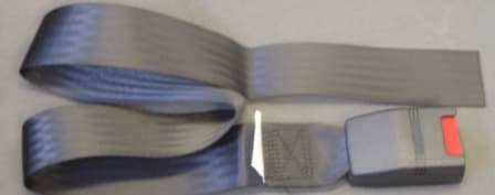 A SEAT BELT COMPONENT THAT IS PART OF THE SAFETY BELT ASSEMBLY , THIS IS THE  PART THAT THE  TONGUE OF THE SEAT BELT CLIPS INTO. CONSISTS OF A PLASTIC BUCKLE 8 CENTIMETERS BY 5 CENTIMETERS BY 3 CENTIMETERS. HAS A PUSH BUTTON ON THE TOP OF THE BUCKLE WHICH HAS THE WORD PRESS MOULDED ON THE TOP OF IT, WHICH ACTIVATES THE CLIP MECHANISM.  THE BUCKLE IS ATTACHED TO A LENGTH OF POLYESTER WEBBING 90 CENTIMETERS BY 5 CENTIMETERS. THIS COMPONENT CAN BE USED IN VARIOUS VEHICLES , CARS, MIMI BUSES AND TAXI'S.