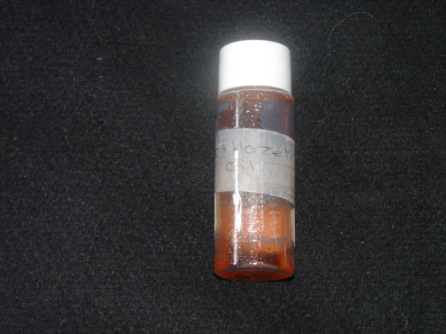 POST CARE AFTER WAX OIL. PRESENTED IN PLASTIC BOTTLE with white sticker on side saying Hazelnut oil and chocolate.  PUT UP FOR THE CARE OF THE SKIN   FOR PRE AND POST CARE TREATMENT USED SPECIFICALLY FOR DEPILATORY WAXING PURPOSES.  TO SOOTHE AND MOISTURISE THE SKIN. . MAIN INGREDIENTS  NCLUDE  Paraffinum Liquidum mineral oil, Prunus armeniaca apricot, Kernal oil, Prunus Amygdalus Dulcis sweet almond oil, Theobroma Cacao Cocoa Seed Butter, Fusanus Spicatus Wood Oil, Parfum fragrance, Farnesol, Benzyl Alcohol, Coumarin, Red 17 C1 26100, Green 6 C1 61565, Yellow 11 C1 47000