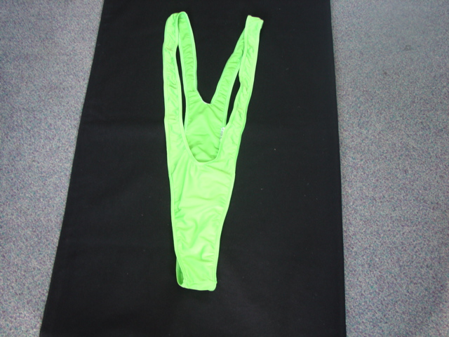 A MANKINI DESIGNED TO COVER THE UPPER PART OF THE BODY FROM THE SHOULDERS TO THE CROTCH. WITH A LINED GUSSET WITH G STRING STYLE AT THE BACK. WITH LONG SHOULDER STRAPS REVEALING THE CHEST BACK AND SIDES. CONSTRUCTED FROM EASY DRY SWIMWEAR FABRIC. 85 PER CENT POLYESTER, 15 PER CENT ELASTANE. PACKAGED IN A POLY BAG FOR RETAIL SALE.