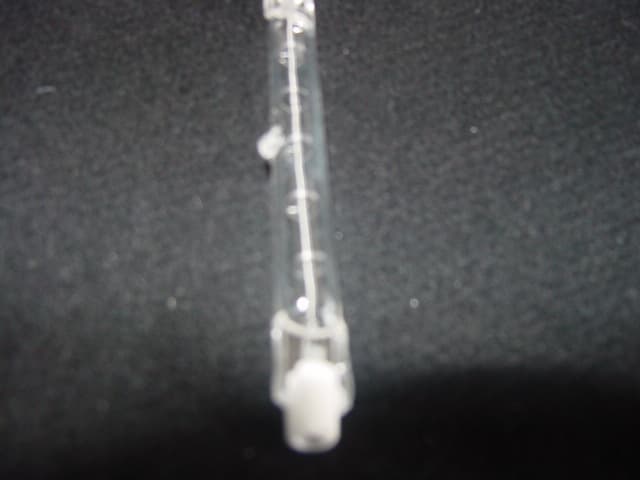 FLOODLIGHT HALOGEN LAMP. A DIE CAST ALUMINIUM FLOODLIGHT LAMP FOR USE IN FLOOD LIGHTING DOMESTIC AND INDUSTRIAL PROPERTIES AS A MEANS OF SECURITY LIGHTING.EXCEEDING 100V.