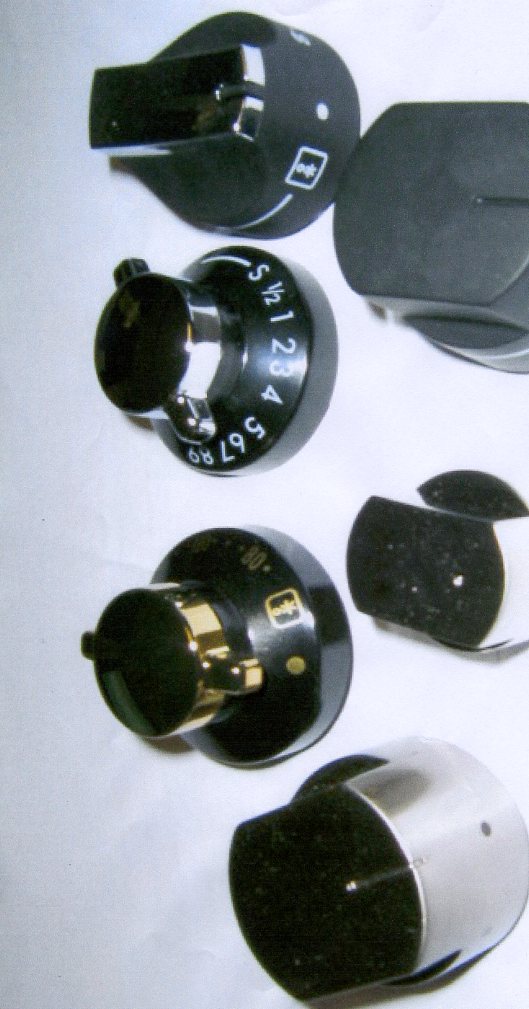 CONTROL KNOBS OF PLASTICS, PLATED IN CHROMED STEEL, NICKEL OR GOLD, FOR DOMESTIC GAS RANGES. THE ITEMS ARE SPECIFICALLY DESIGNED AND CONSTRUCTED TO FIT PARTICULAR MODELS OF GAS RANGES.