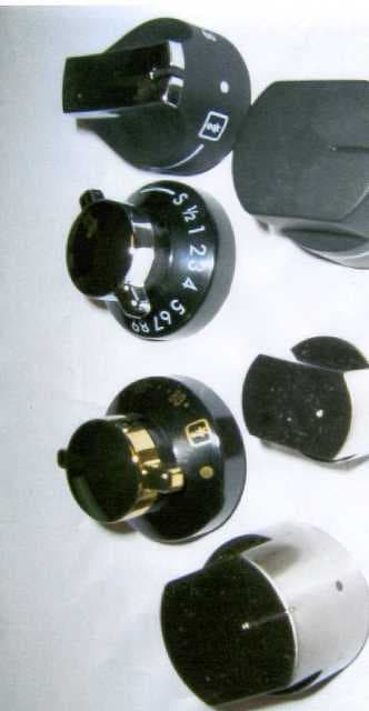 CONTROL KNOBS FOR DOMESTIC ELECTRIC AND COMBINATION (ELECTRIC AND GAS) COOKERS PLATED IN CHROME, NICKEL OR GOLD CONSTRUCTED FROM PLASTIC. THE ITEMS ARE SPECIFICALLY DESIGNED AND CONSTRUCTED TO FIT PARTICULAR MODELS/RANGES OF COOKERS.