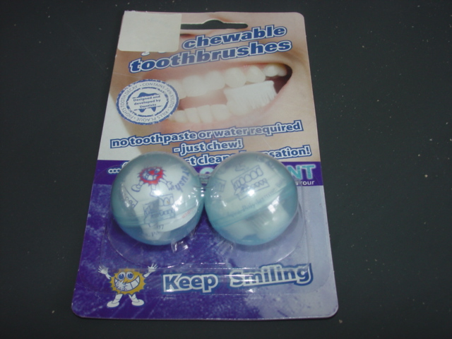 AN ALL IN ONE TOOTHBRUSH AND BREATH FRESHENER.  A SMALL SOFT MINI PLASTIC BRUSH IS DESIGNED TO BE CHEWED.  WHILST CHEWING, THE NATURAL ACTION OF THE BRUSH CLEANS THE TEETH.  AT THE SAME TIME A FRESH MINTY FLAVOURED PASTE IS RELEASED FROM THE BRUSH TO FRESHEN THE BREATH. DISCARDED ONCE USED.  PACKED IN CLEAR PLASTIC SPHERE WITH PRINTED INSTRUCTIONS.  CAN BE SOLD FROM VENDING MACHINES OR VIA STANDS IN BLISTER CARD PACKS.