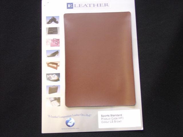 COMPOSITION LEATHER IN ROLLS. MADE FROM LEATHER FIBRES REINFORCED WITH SYNTHETIC FIBRES. TO BE USED FOR THE MANUFACTURE OF FOOTWEAR, BAGS, SOFAS AND OTHER PRODUCTS. IMPREGNATION IS ADDED TO PROVIDE COLOUR AND SUPPLENESS. LEATHER FIBRES 50.5, SYNTHETIC FIBRES AND SCRIM 33.2, IMPREGNATIONS 4.6 AND COATING 11.7 PER CENT.