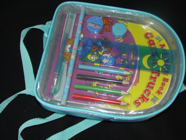 A GEL BALL POINT PEN. COLOURED INK. PACKAGED FOR RETAIL SALE WITH A RULER, RUBBER, SHARPENER,  4 COLOURED PENCILS,  A WRITING PENCIL, 2 ACTIVITY BOOKS IN A RUCKSACK WHICH HAVE ALL BEEN CLASSIFIED SEPARATELY.